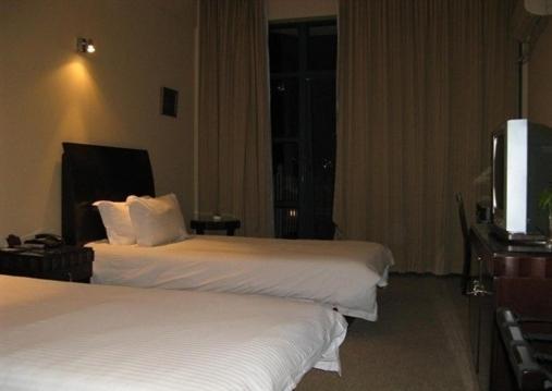 Baolong Homelike Hotel - Wusong Branch Xangai Quarto foto